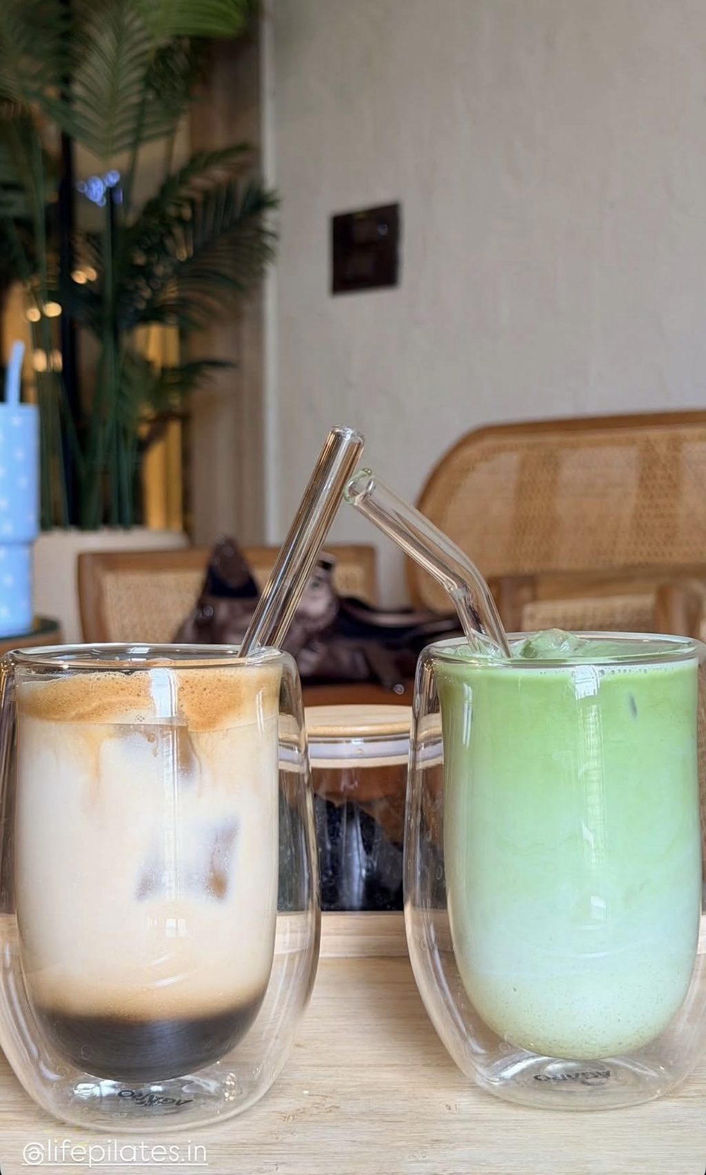 An iced latte and an iced matcha in glass cups at Life Café